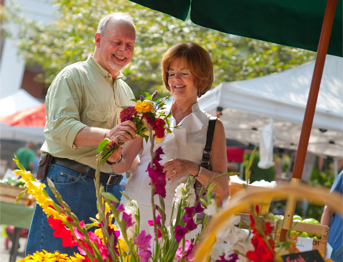 Couple holding flowers