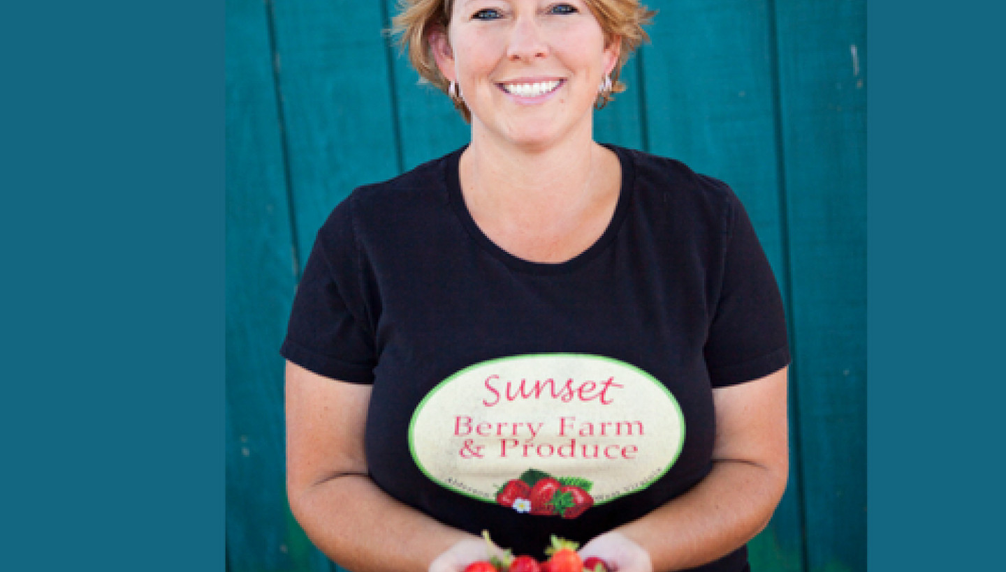 Jennifer Gilkerson holding strawberries