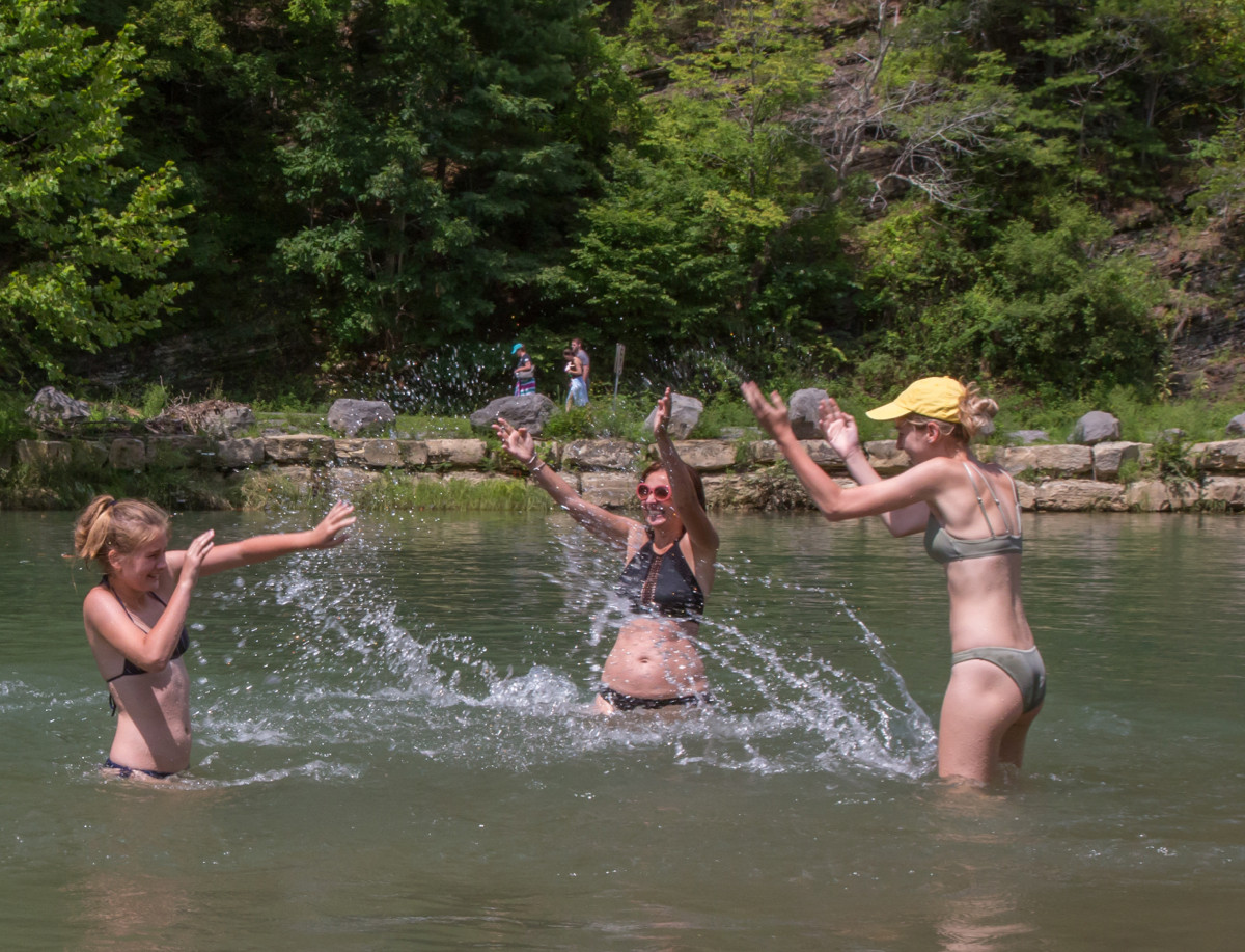 Family playing in water