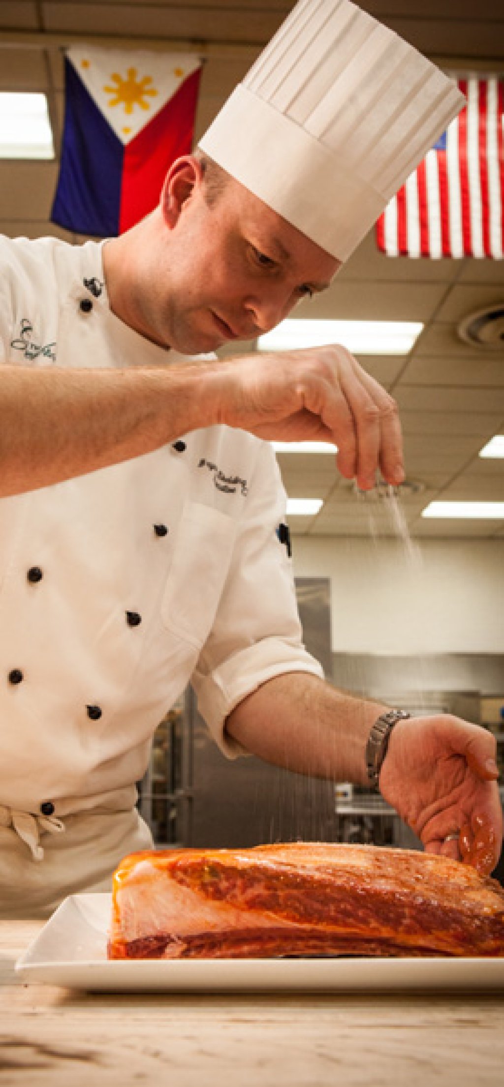 Chef preparing beef short ribs.