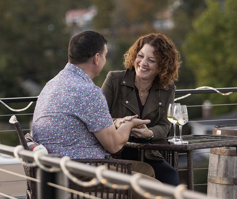 couple on rooftop at the schoolhouse hotel 800x675