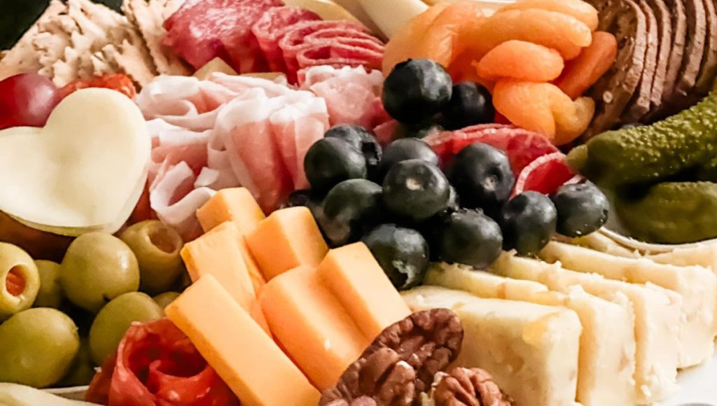 Sweet Cedar & Company Valentine Box featuring heart shaped cheeses and meats.